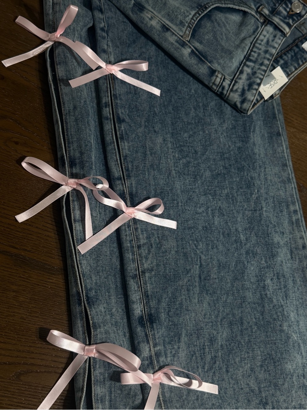 Women's Blue Denim Jeans with Pink Ribbon Detail